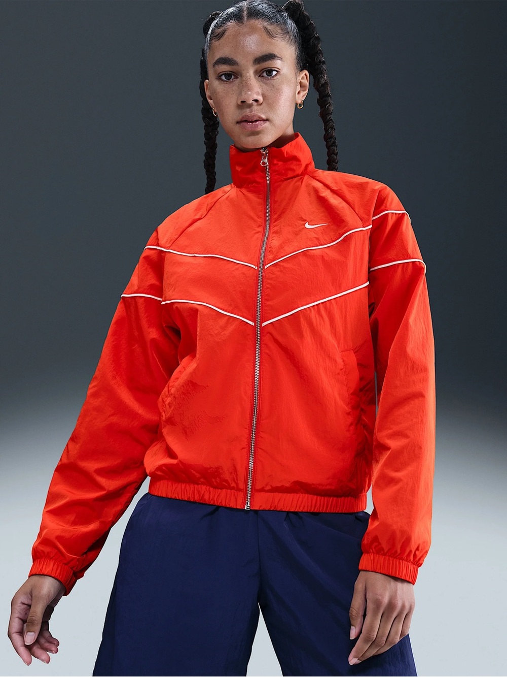 Nike
Nike orange Windrunner Women's Loose UV Woven Full-Zip Jacket sz M